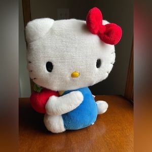 Hello Kitty Sanrio 2009 Plush 10” sitting stuffed animal holding apple